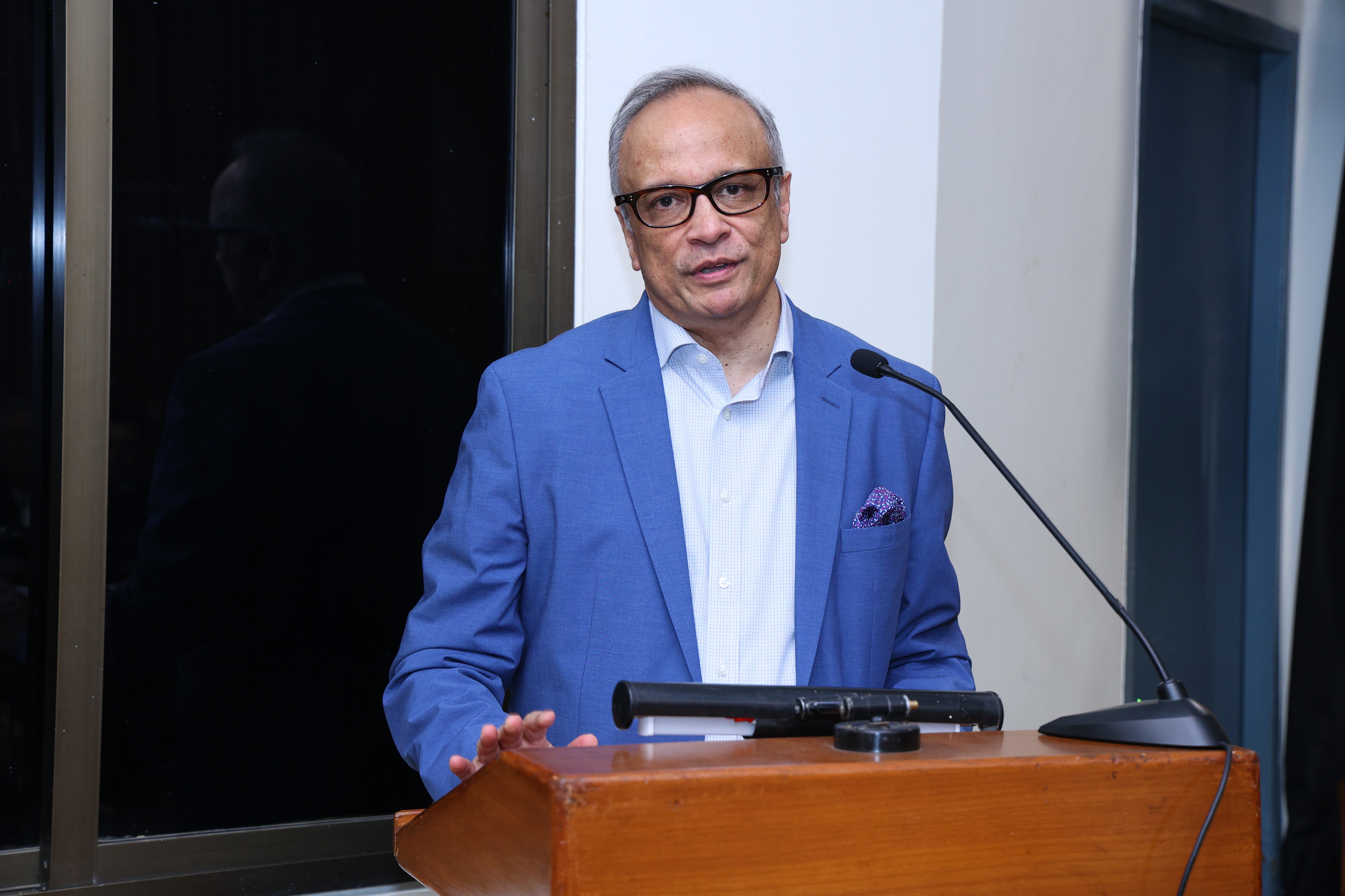 Samiran Gupta giving the introduction at the IIC book launch